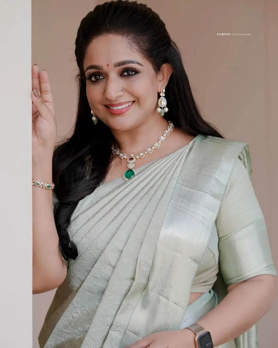 kavya madhavan in green saree blouse